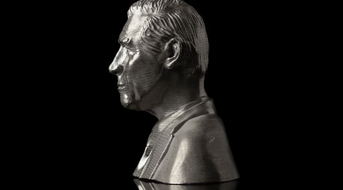 Stainless steel 3D printed bust of King Charles III on a black background to mark his coronation